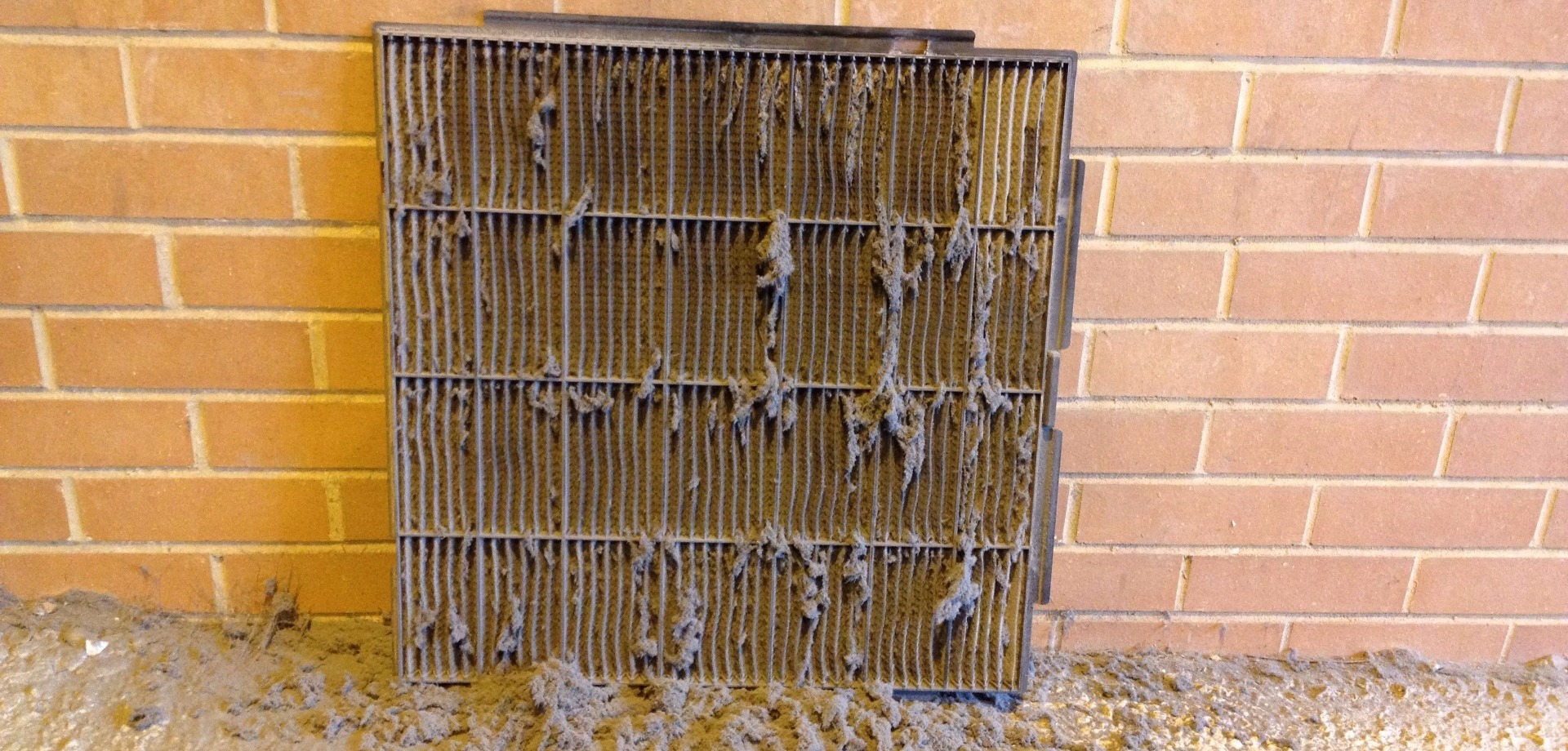 Image of commercial ventilation system clogged with dust and serviced by our Hinckley ventilation maintenance company in Leicester